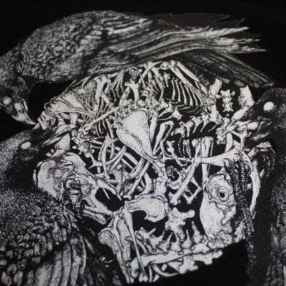 Close-up on black and white, tattoo inspired, gothic, witchy, pagan art on clothing piece. Birds & Bones collection features nature and death inspired artwork on t-shirts and sweathirts.