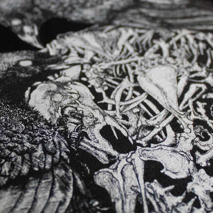 Close-up on black and white, tattoo inspired, gothic, witchy, pagan art on clothing piece. Birds & Bones collection features nature and death inspired artwork on t-shirts and sweathirts.