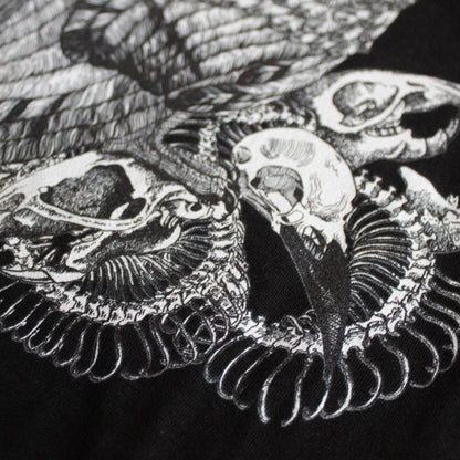 Close-up on black and white, tattoo inspired, gothic, witchy, pagan art on clothing piece. Birds & Bones collection features nature and death inspired artwork on t-shirts and sweathirts.