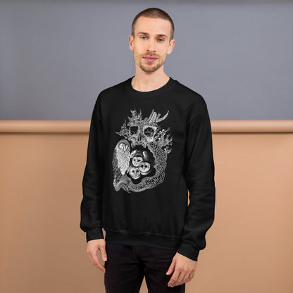 Model wearing sweatshirt with black and white, tattoo inspired, gothic, witchy, pagan art.