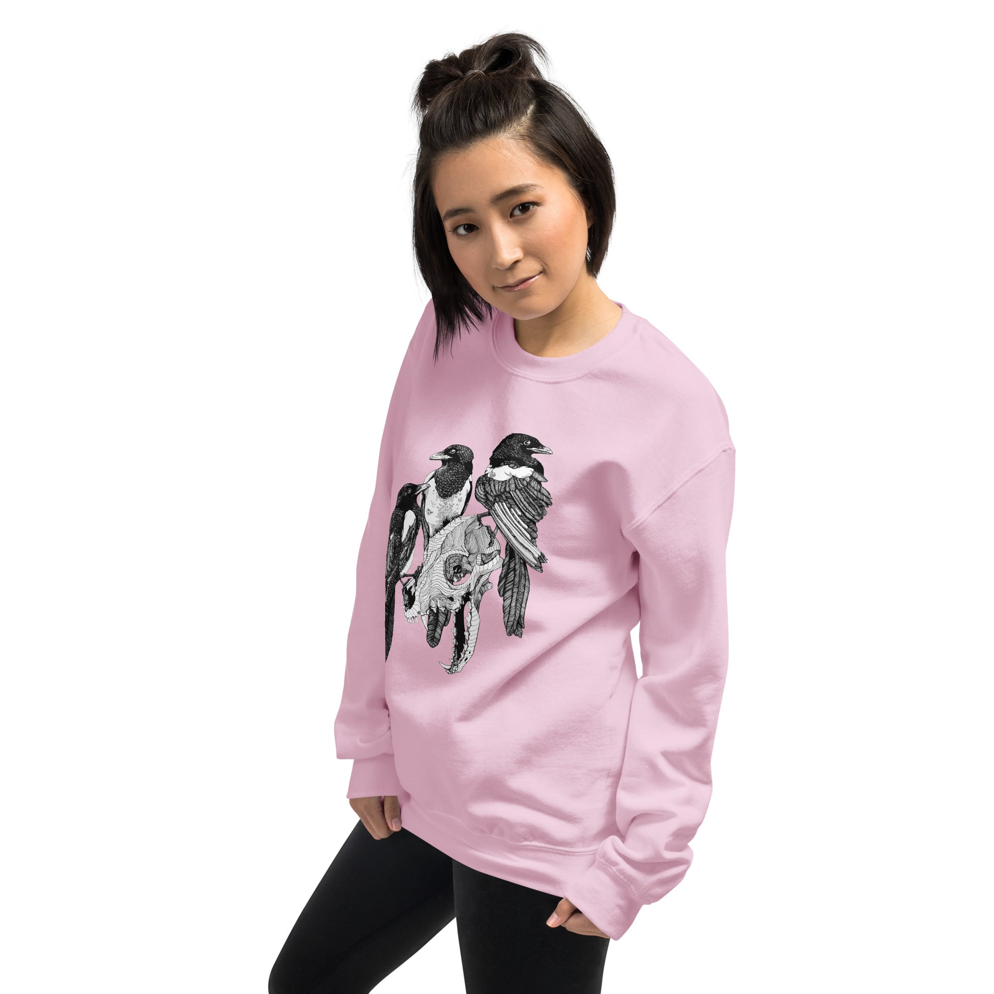 Model wearing sweatshirt with black and white, tattoo inspired, gothic, witchy, pagan art.